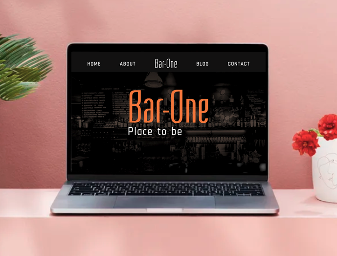 computer mockup photo of a laptop with Bar One home page displayed
